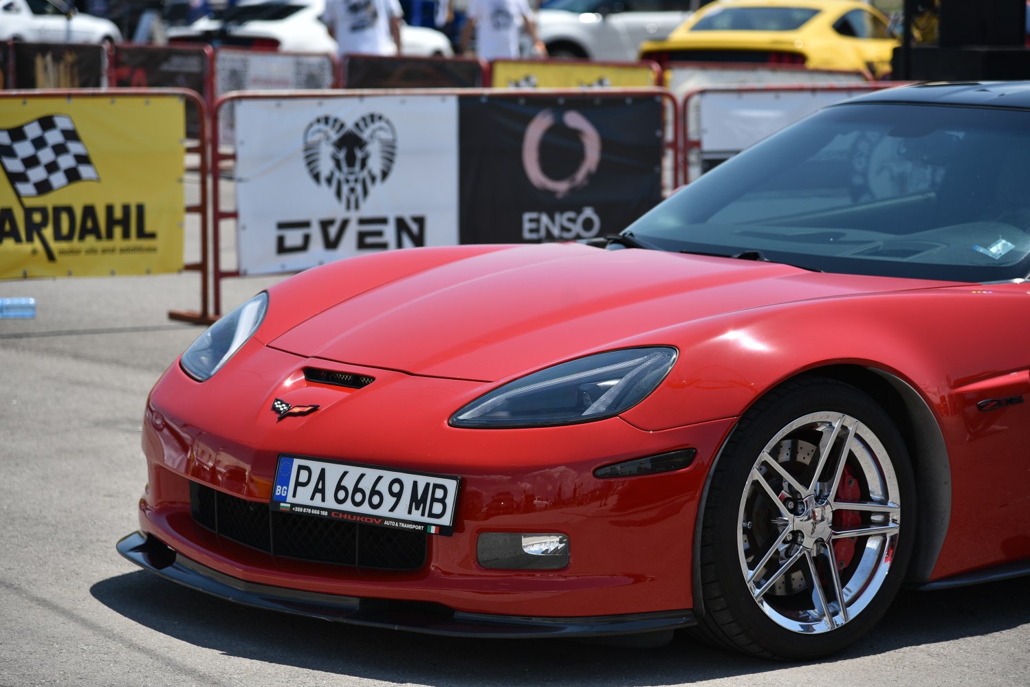 Front view with headlights and alloy wheel close-up