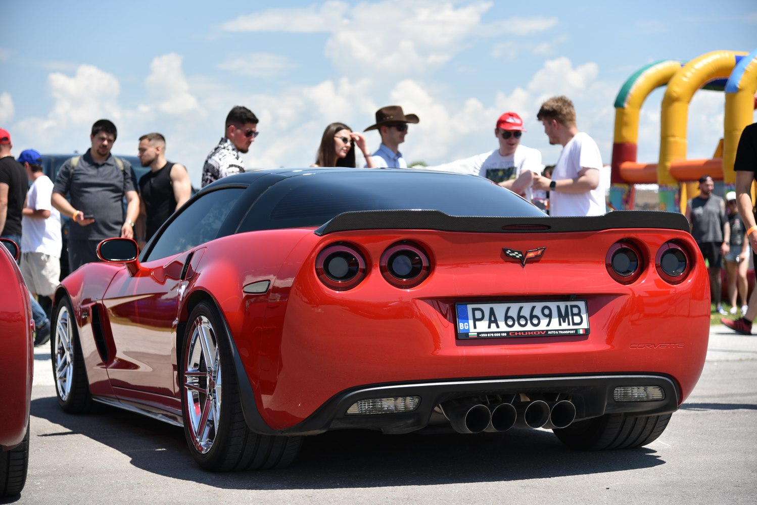 Rear view with quad exhaust and round taillights