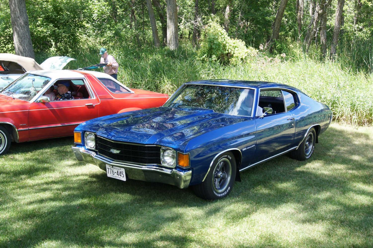 Front grille and side profile of a 1972 muscle car coupe