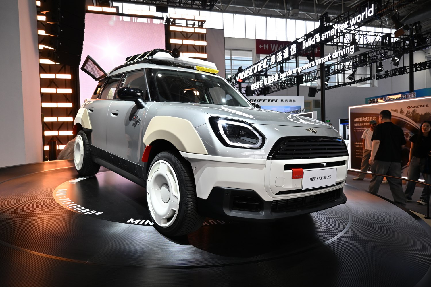 Futuristic off-road SUV with rugged body cladding and roof rack