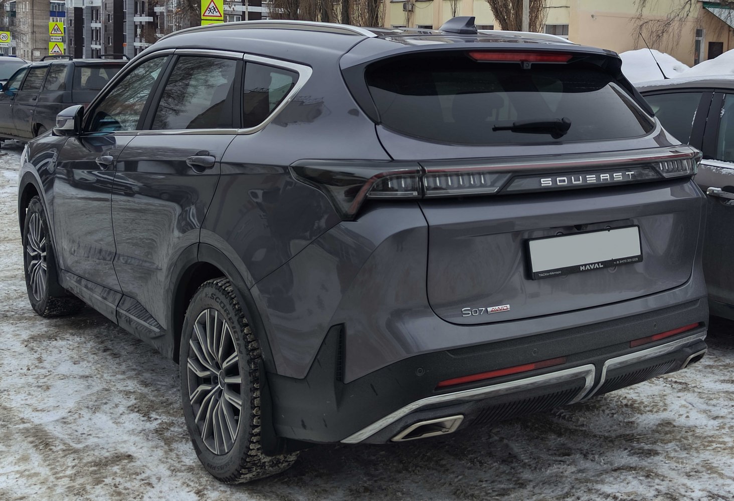Rear profile with LED tail lights and sporty dual exhaust