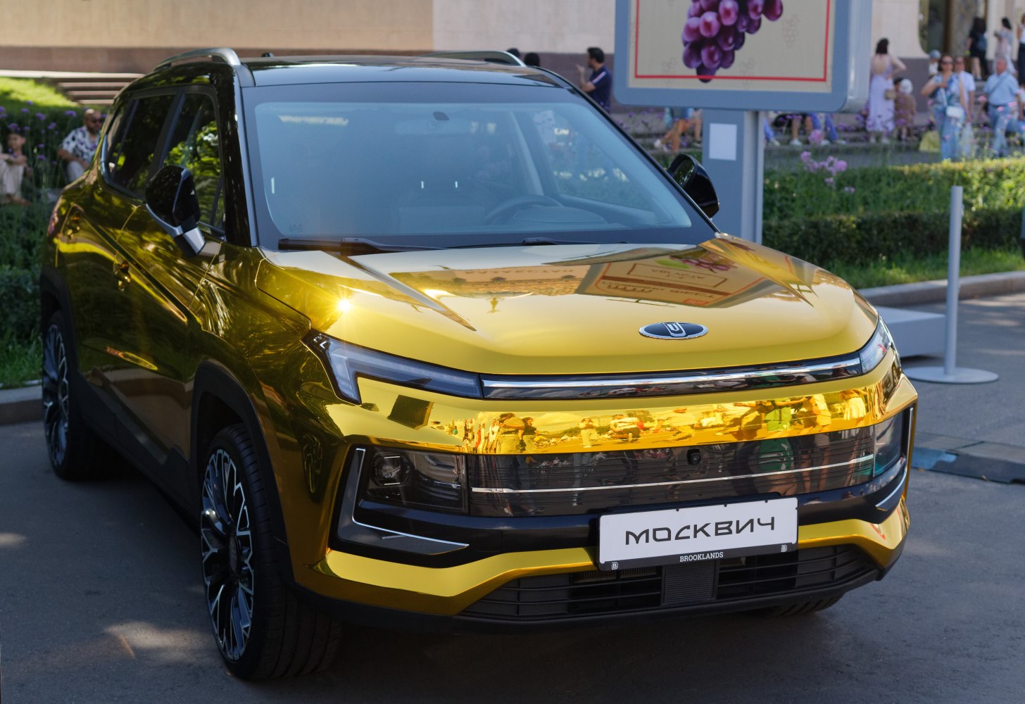Bold front with sharp LED lights and metallic reflective hood