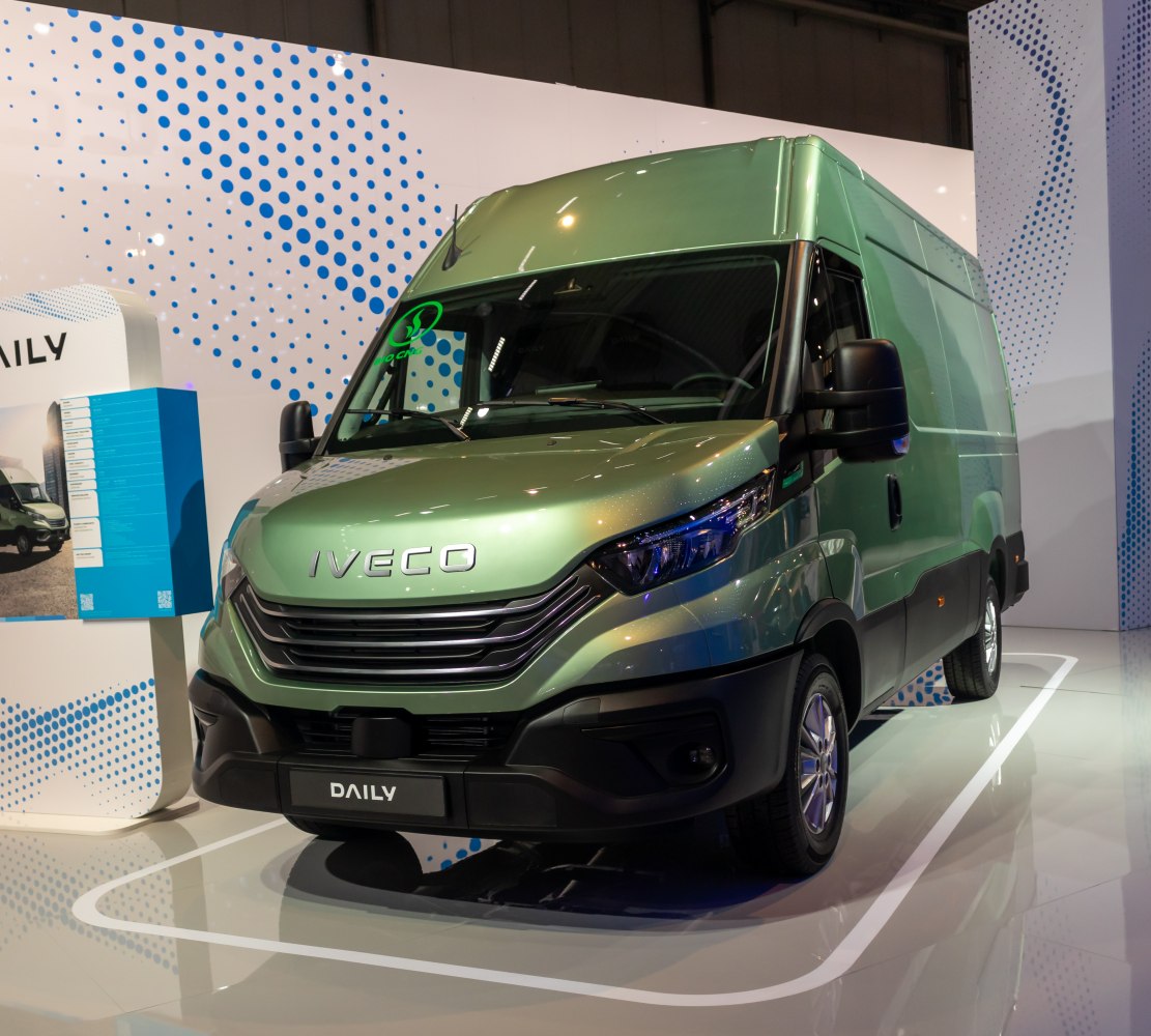 Modern high-roof panel van with streamlined front and side cargo body