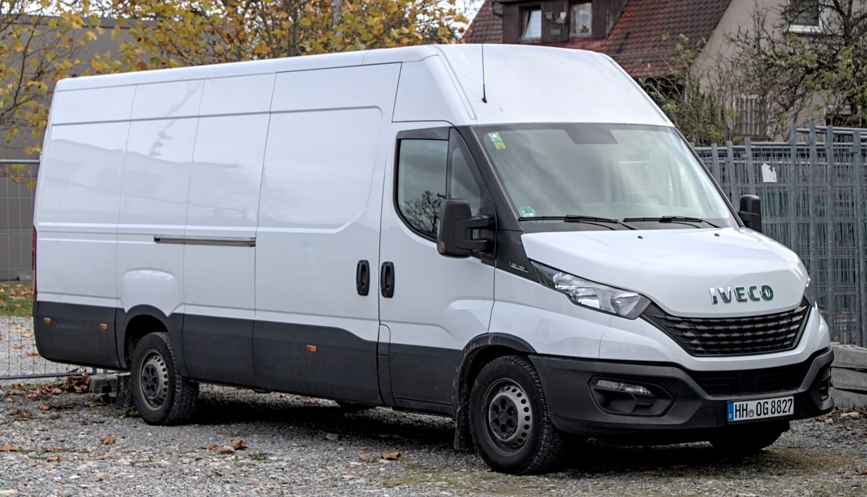 White large panel van with modern front grille and black trim