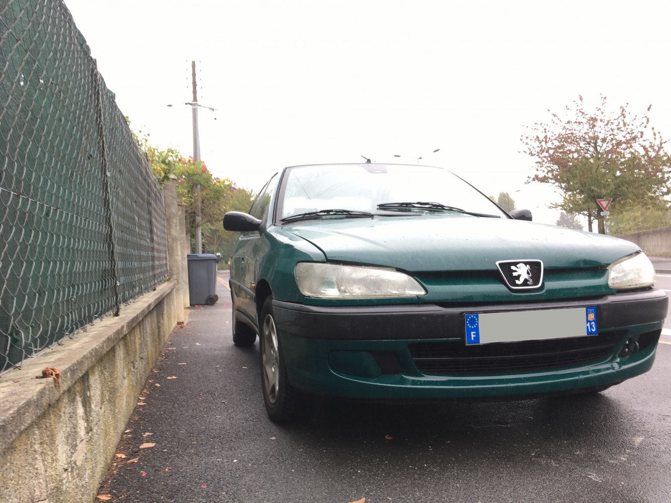 Front view with updated headlights and grille of a facelifted hatchback