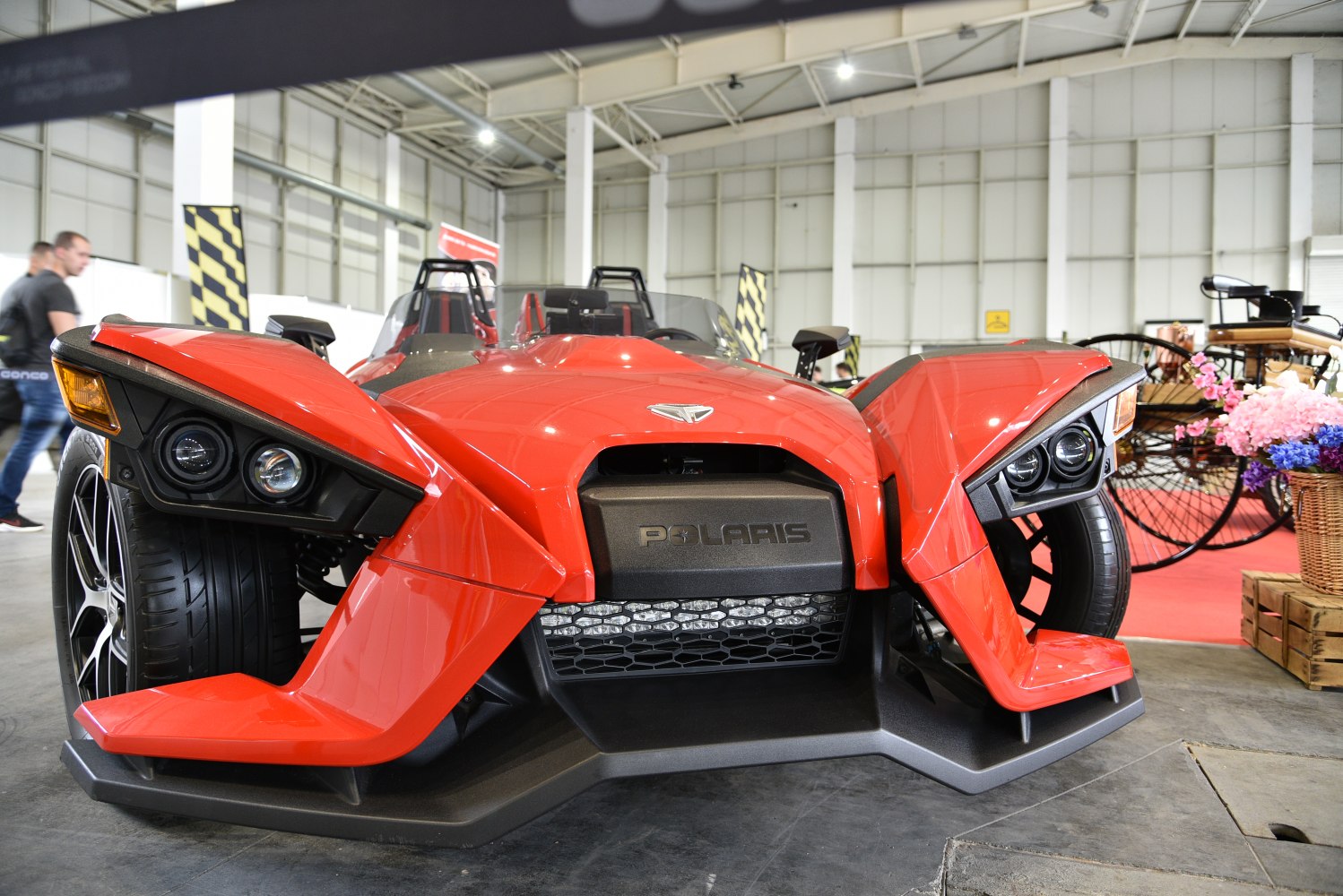 Front end view with distinctive headlights and aggressive styling