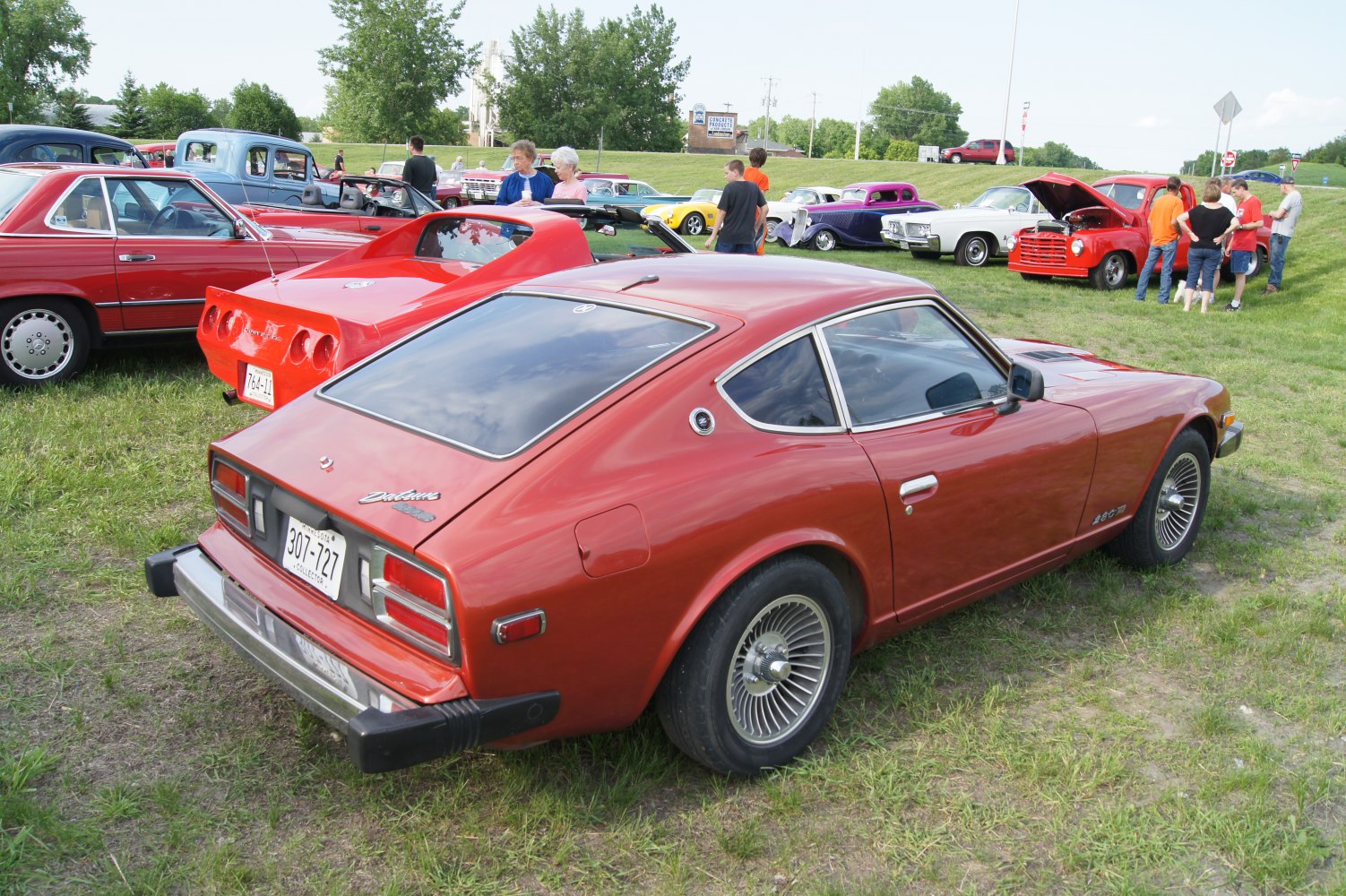 Rear and side view of 1970s vintage sports coupe with distinctive wheels.