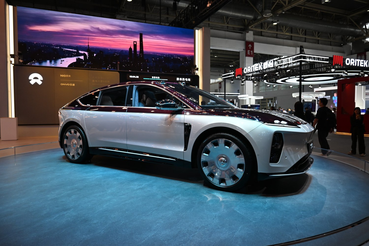 Futuristic electric sedan with distinctive alloy wheels and streamlined design