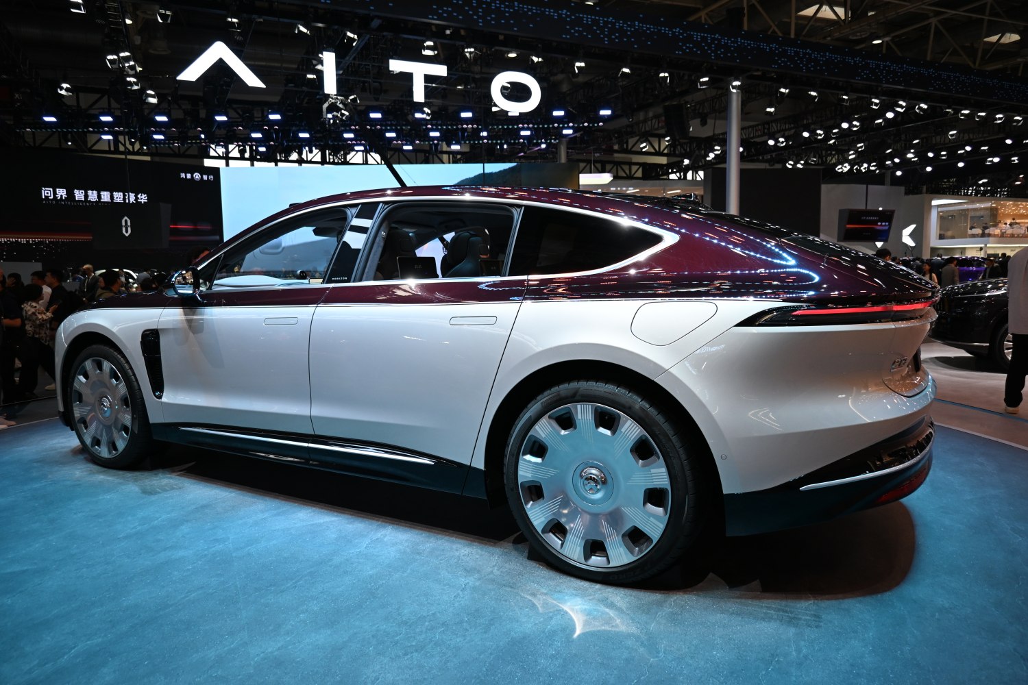 Two-tone electric luxury sedan with aerodynamic unique wheels