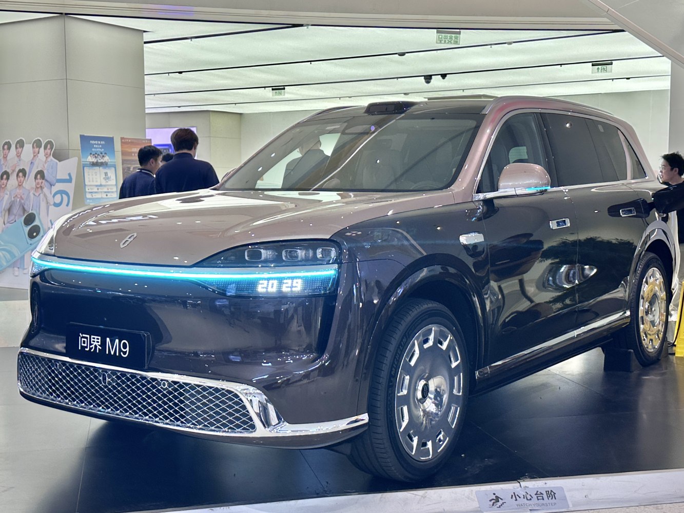 SUV with continuous LED headlight bar and digital display