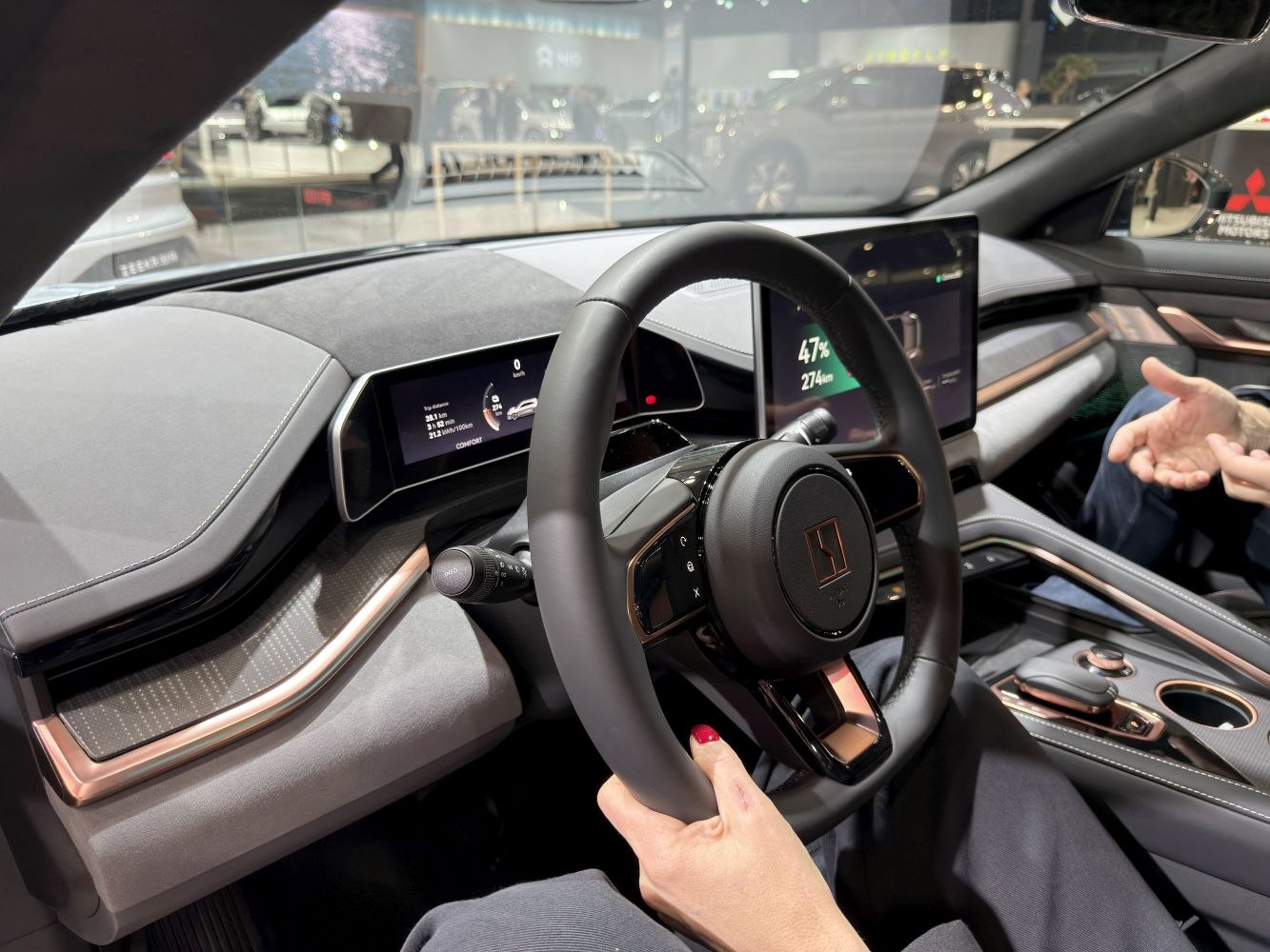 Digital instrument cluster and modern steering wheel in vehicle interior