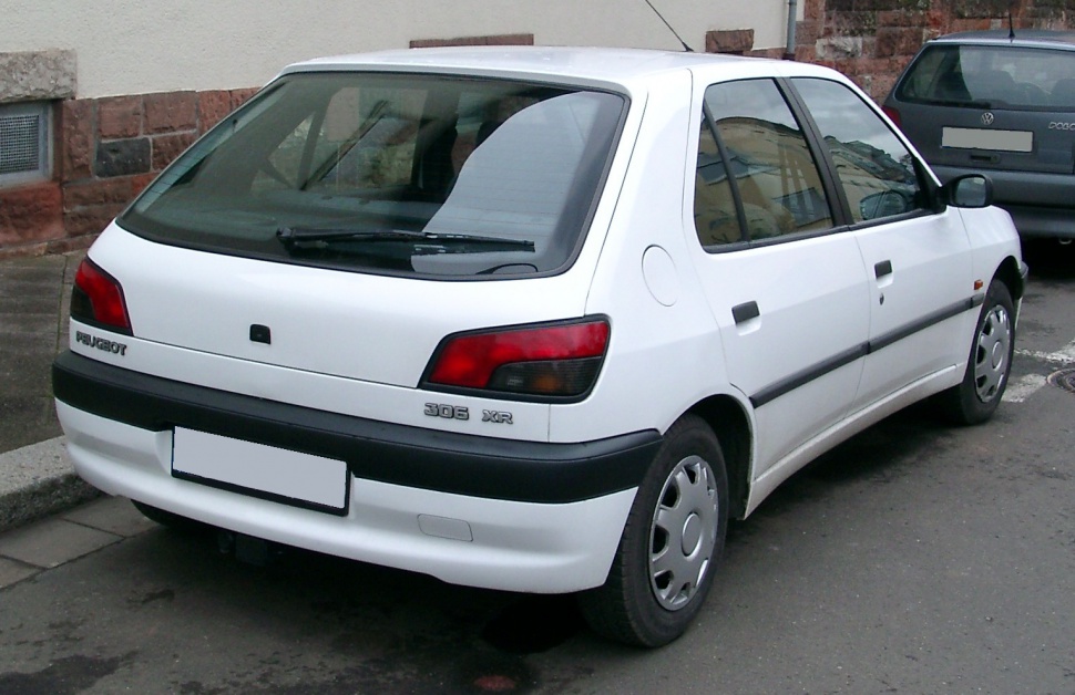 Rear view of hatchback with distinctive taillights and rear wiper