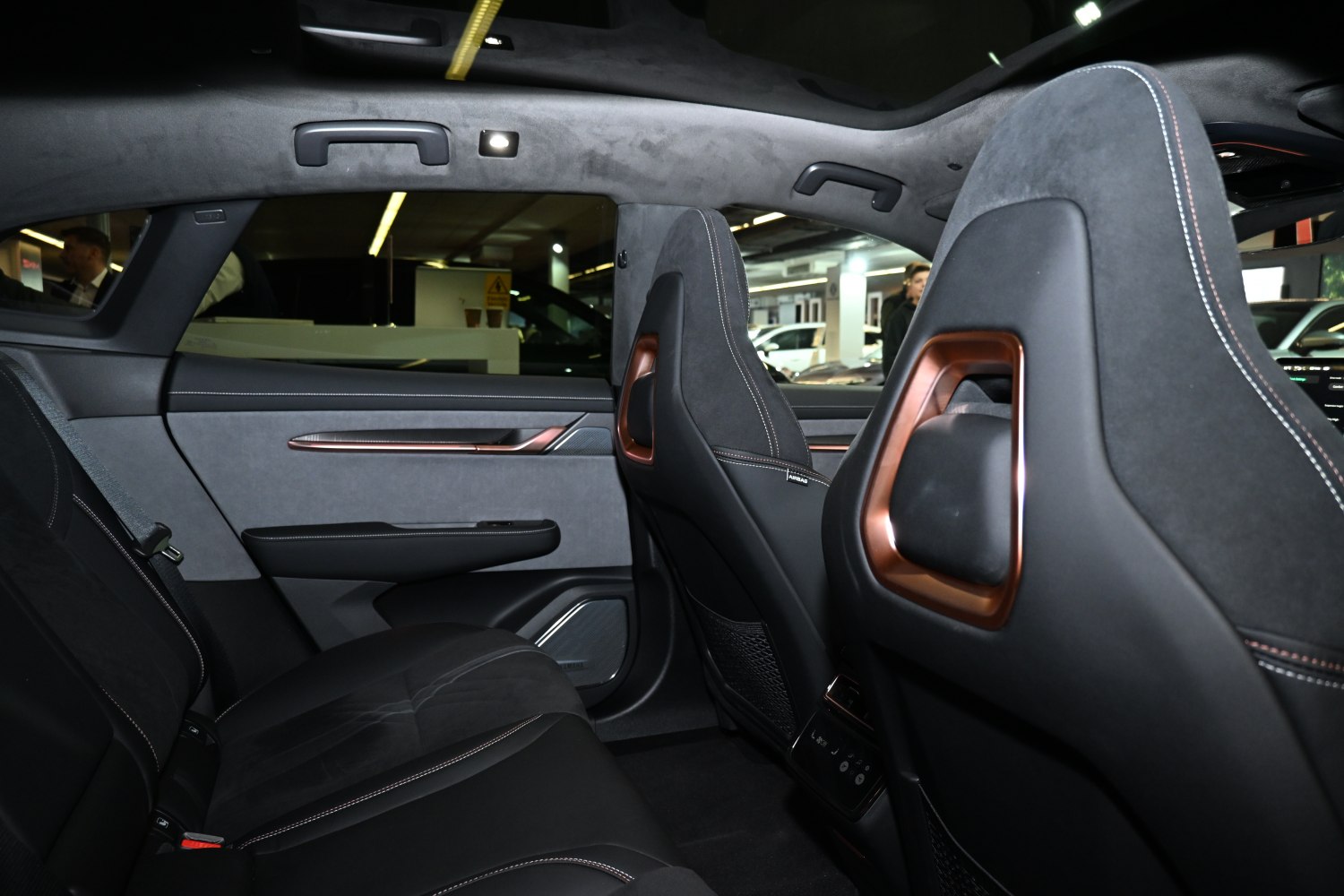 Rear interior with luxury seats and ambient lighting
