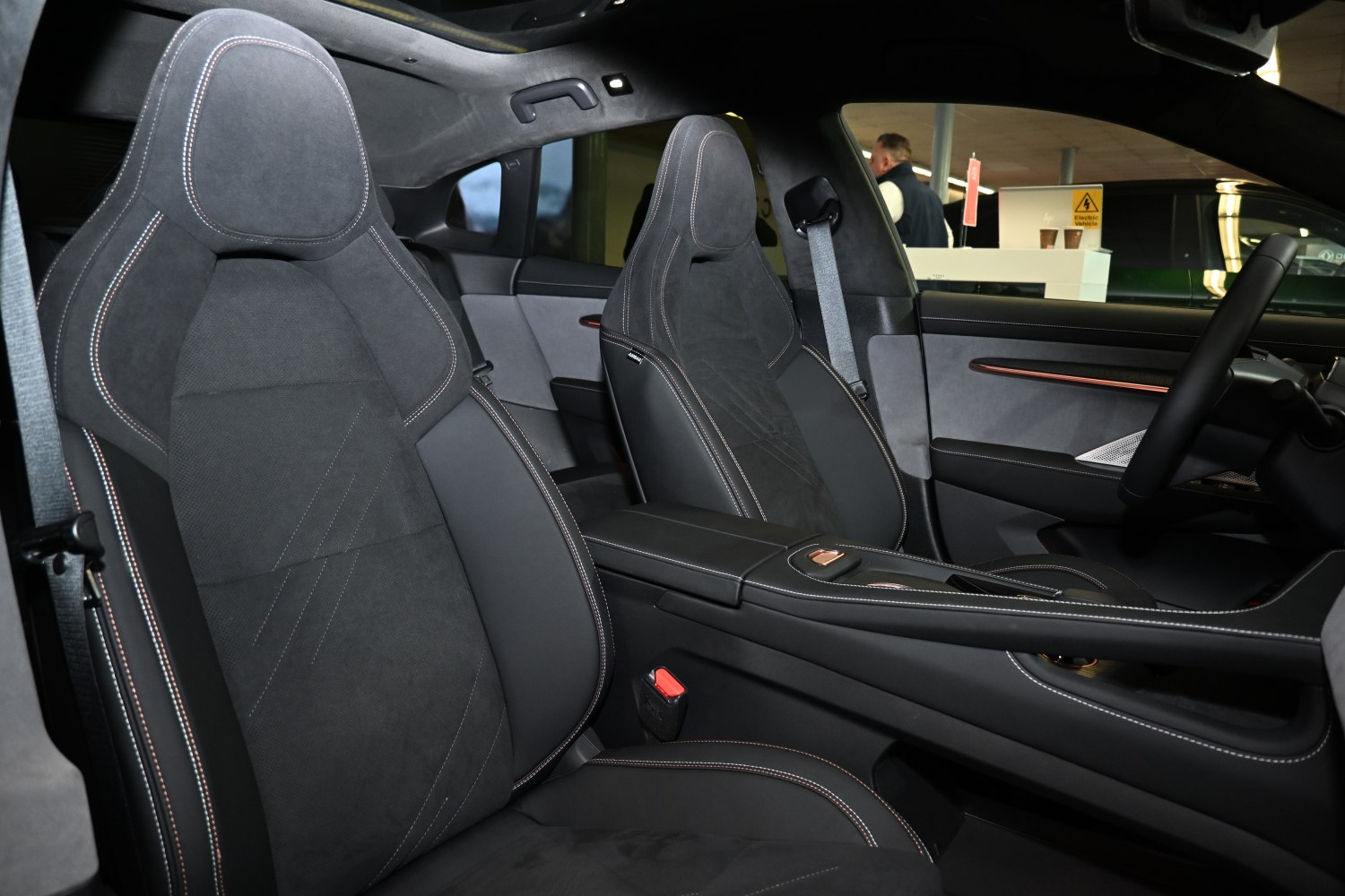 Sports-style front seats with detailed stitching and modern design