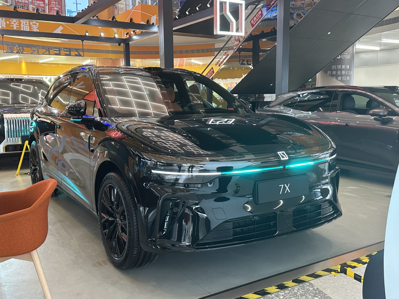 Black SUV with LED strip front lighting and black alloy wheels