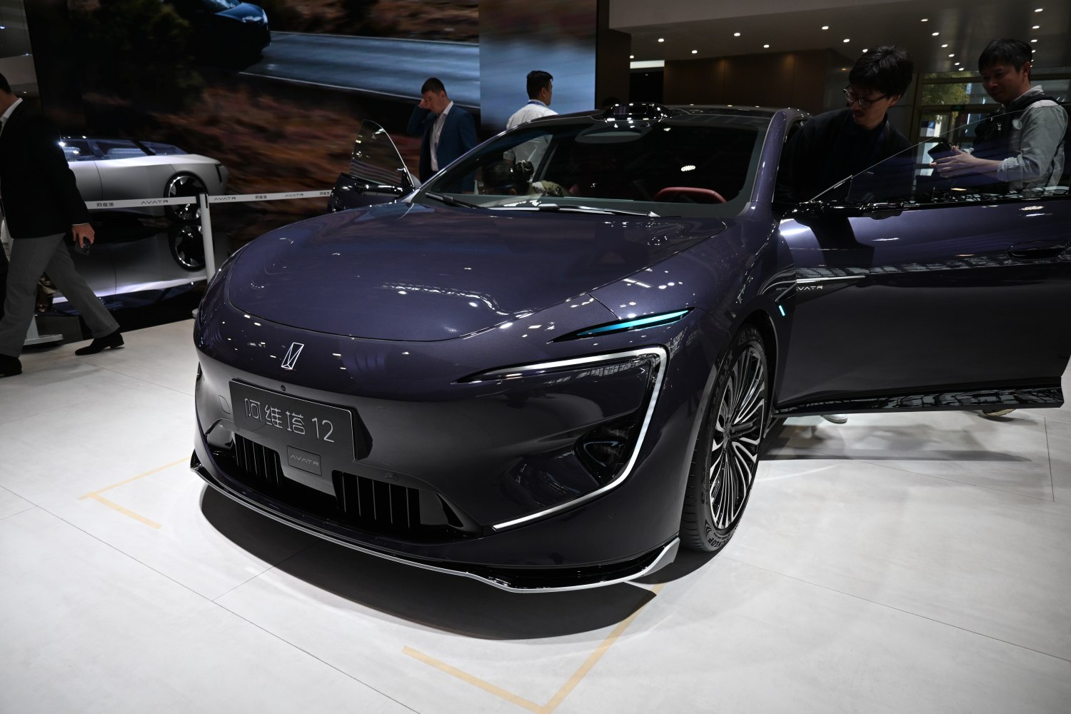 Futuristic front aerodynamic design with distinct headlights and open driver door