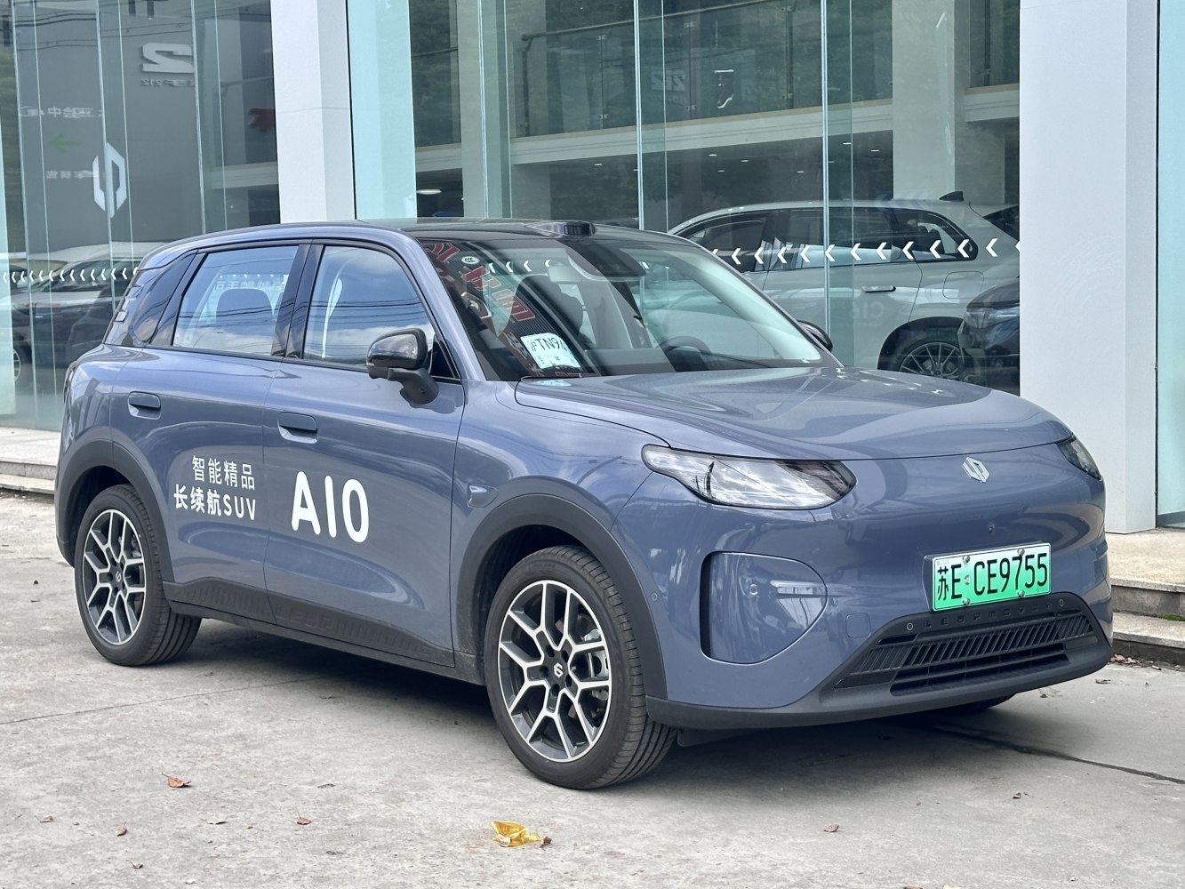 Aerodynamic crossover SUV with LED headlights and multi-spoke alloy wheels