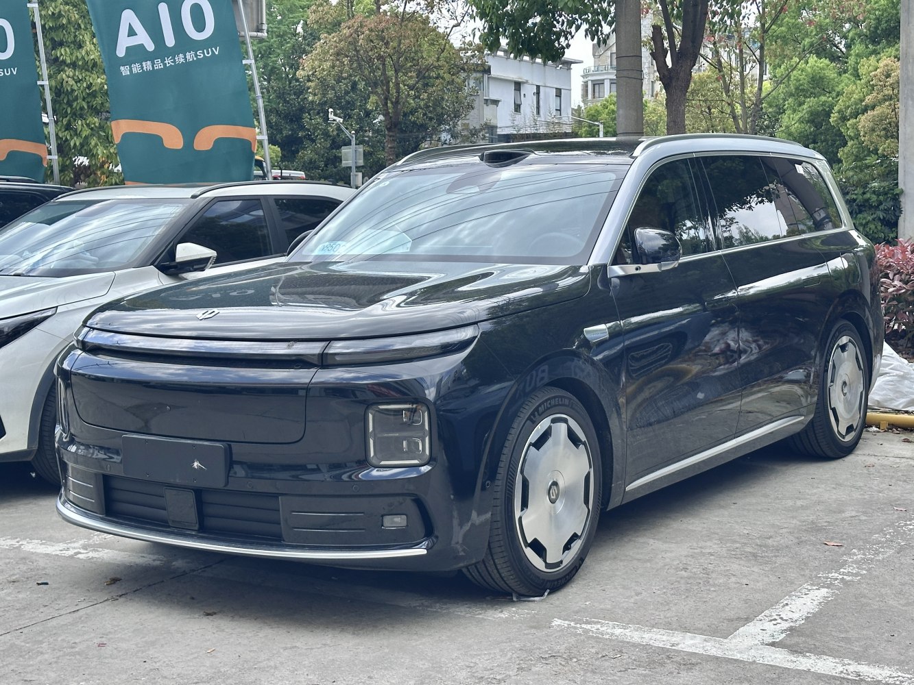 Seamless front light bar and unique square LED headlamps on sleek electric SUV