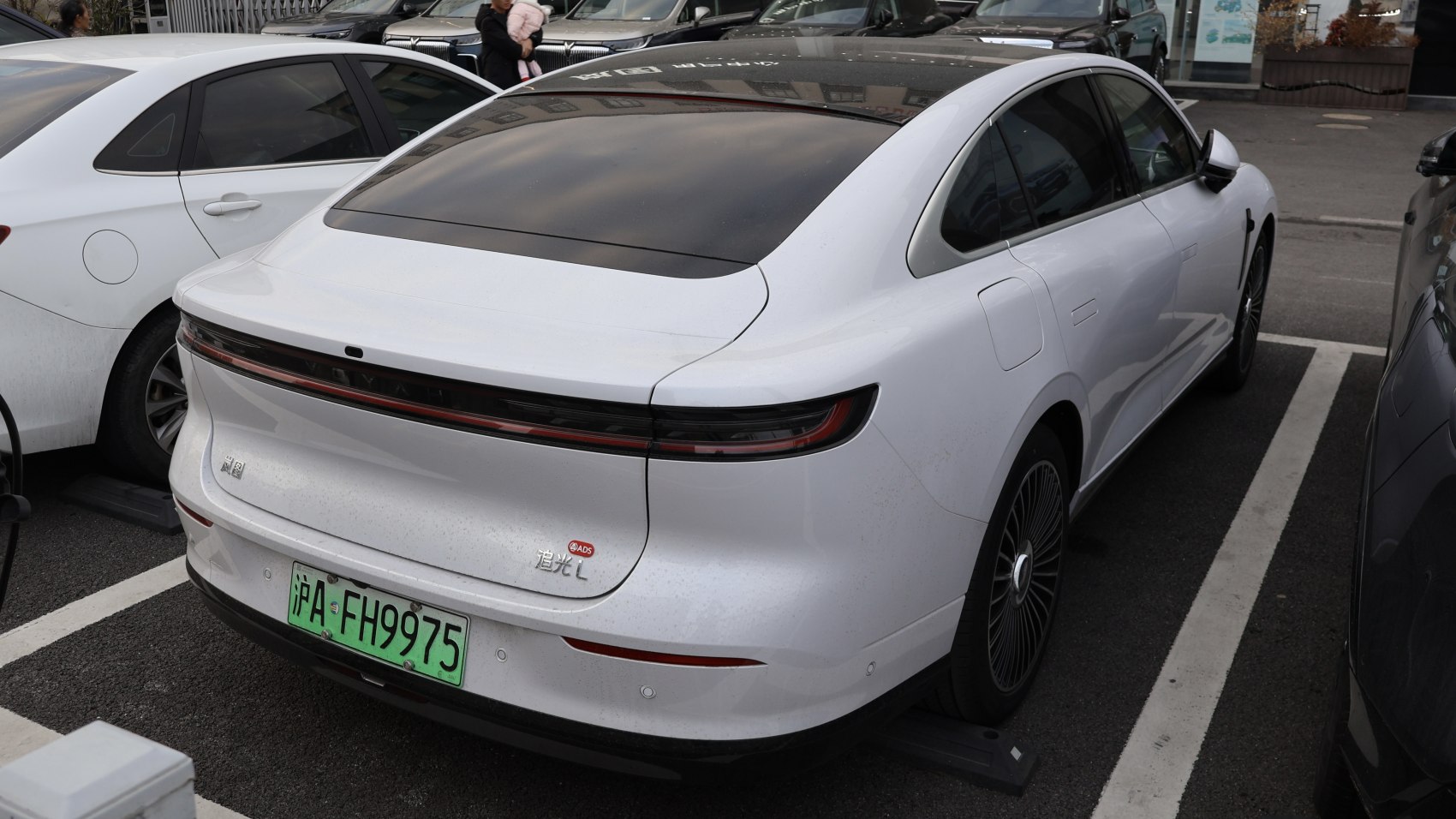 Rear view with continuous tail light bar and aerodynamic body