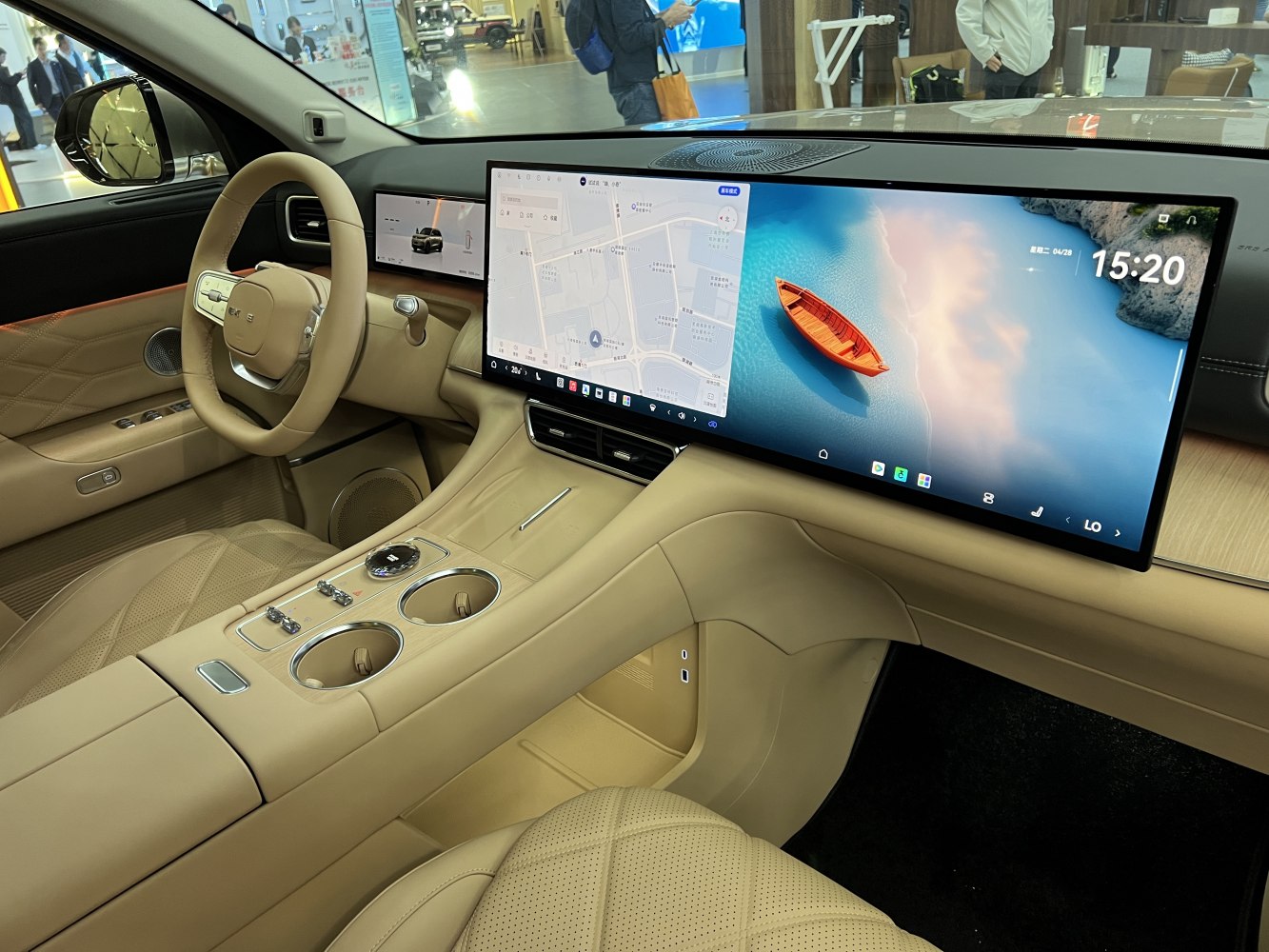 Dual large digital displays and quilted beige leather interior