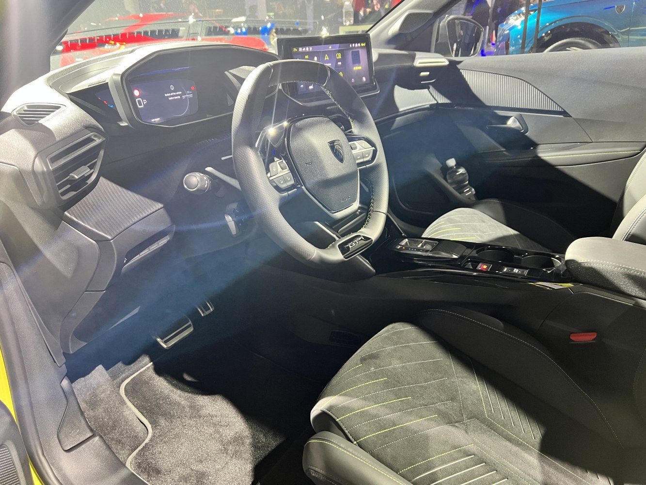 Modern car interior with digital dashboard and multifunction steering wheel