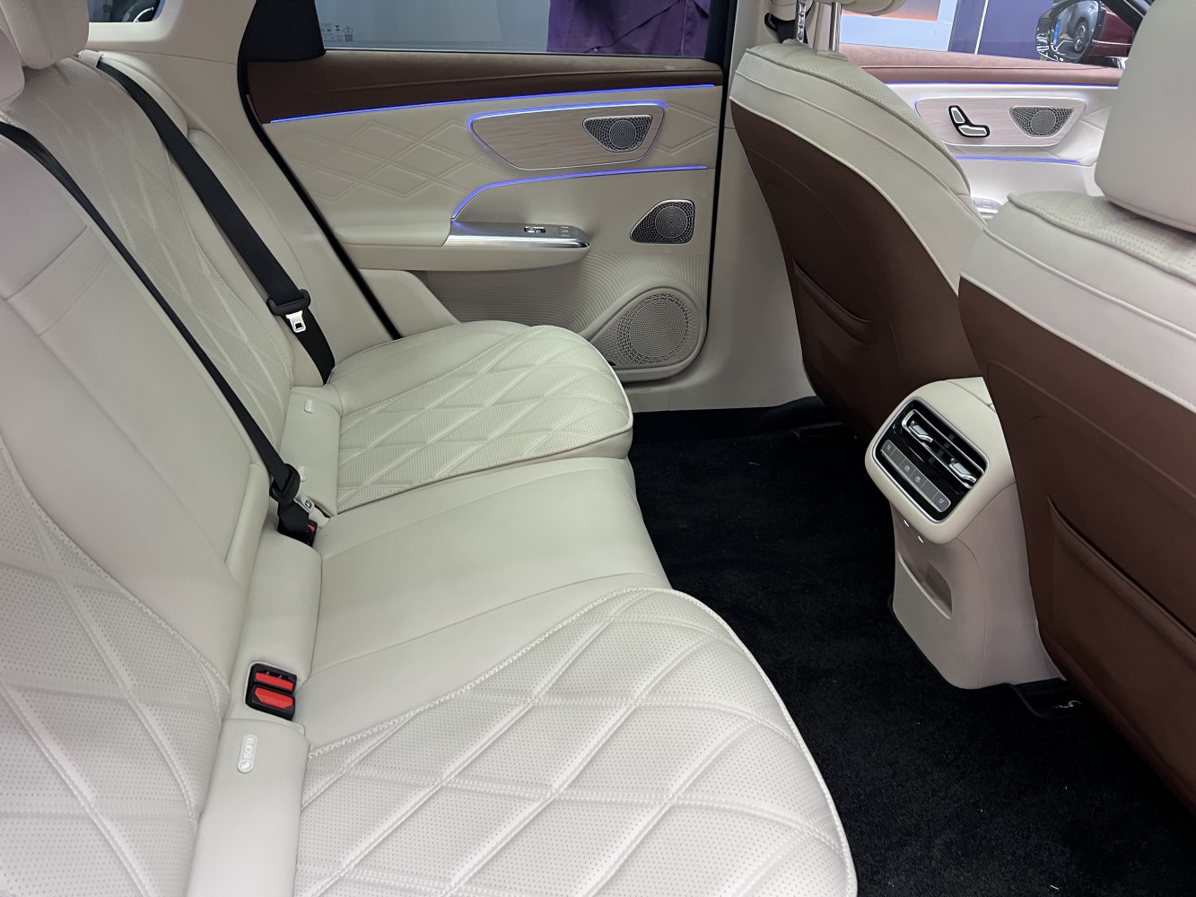 Rear seat luxury interior with quilted leather and ambient lighting