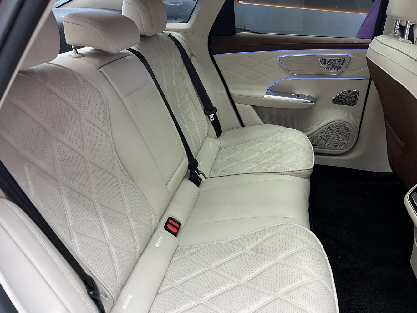 Luxury rear seat with quilted leather and ambient lighting
