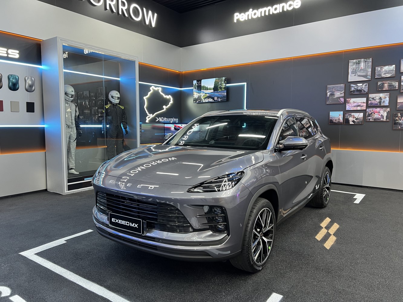 Front view of a sleek SUV with dynamic grille and LED headlights