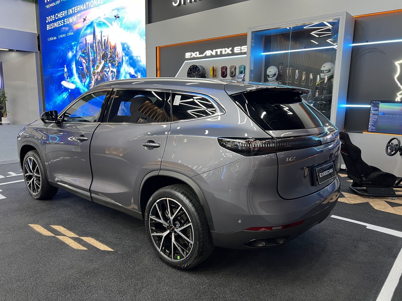Rear side view and alloy wheels of a modern SUV with tinted windows