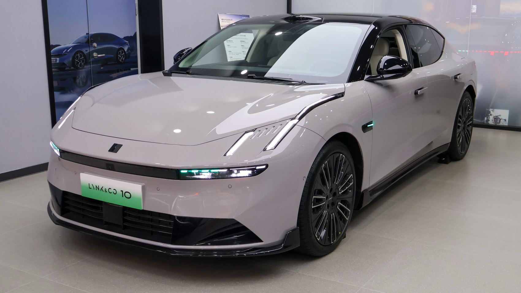 Modern electric vehicle front with LED headlights and aerodynamic styling