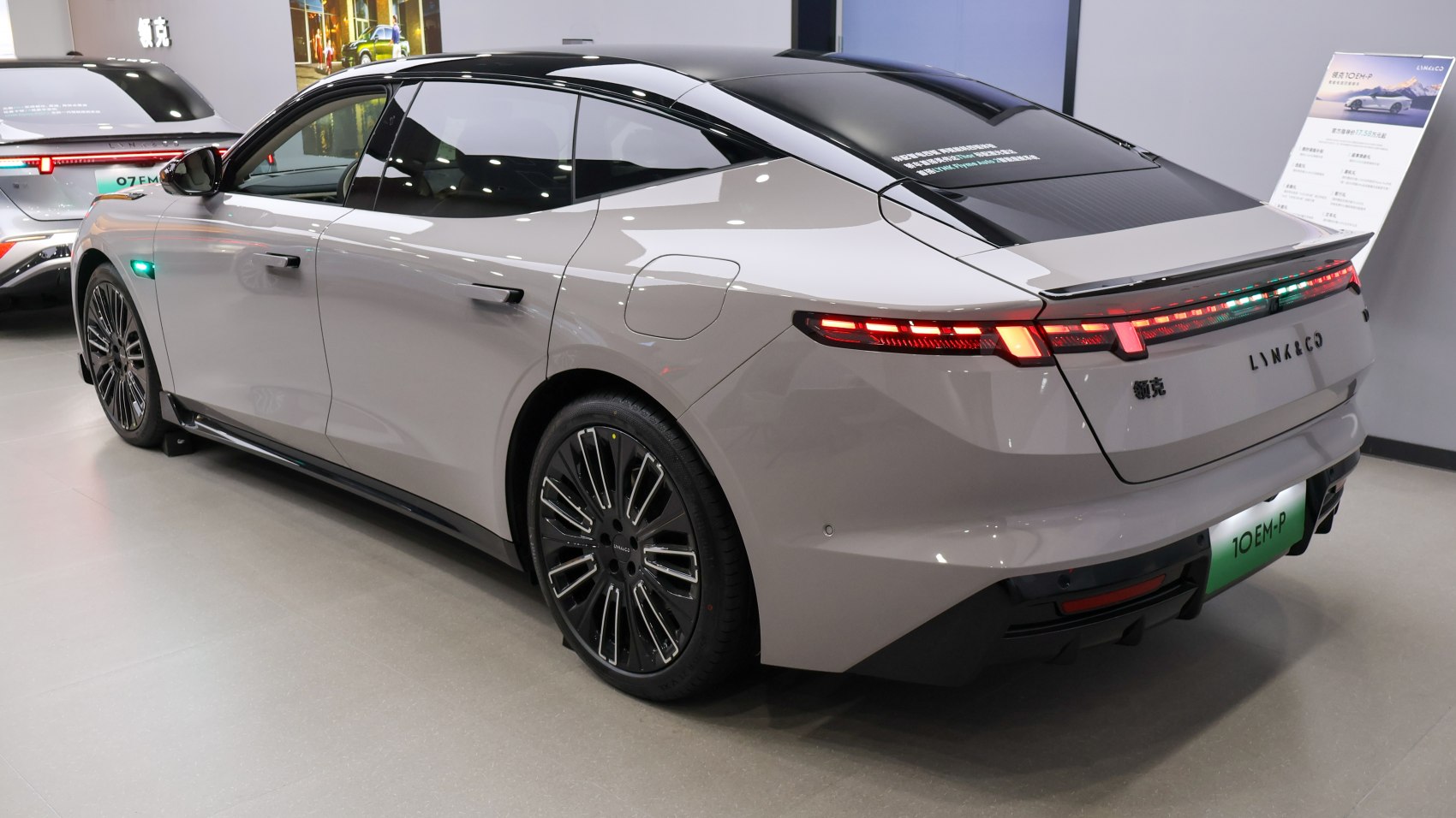 Sleek modern sedan rear with LED tail lights and aerodynamic features