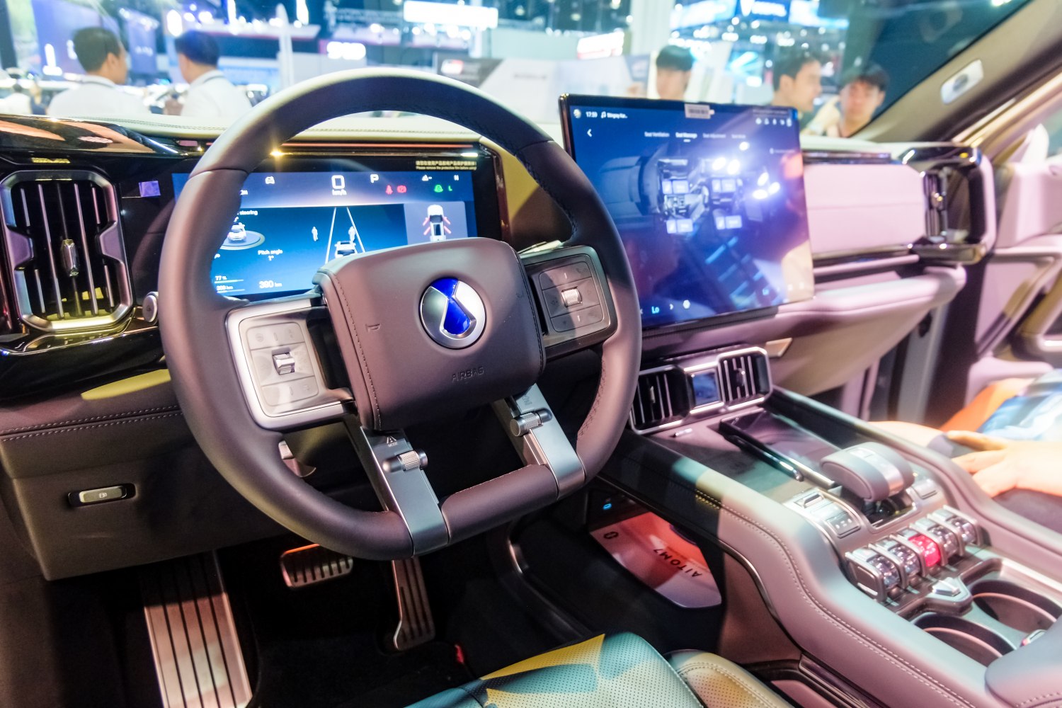 Modern digital dashboard and large touchscreen display in car interior
