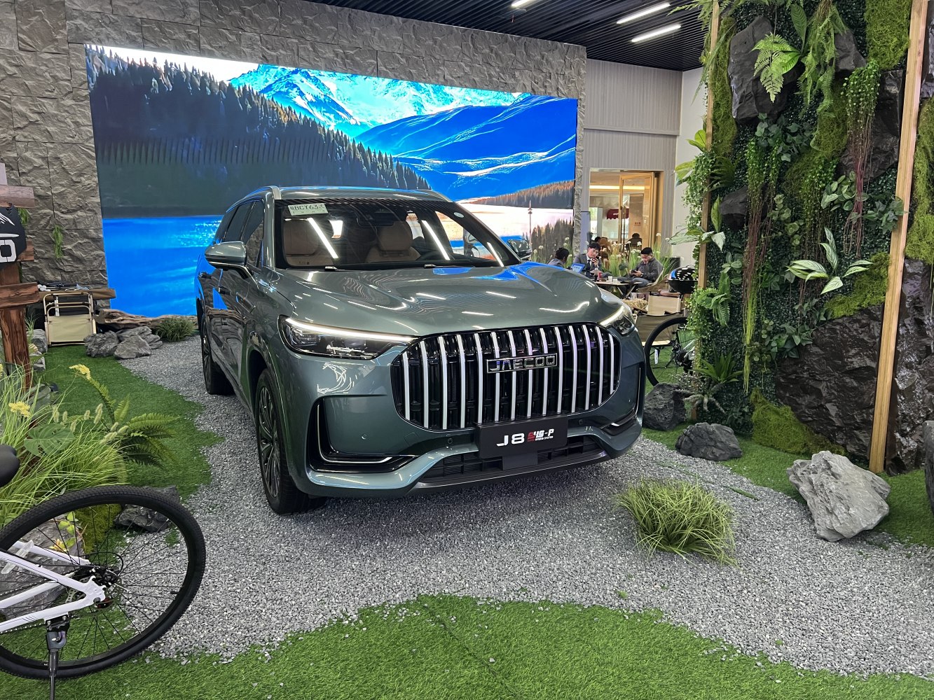 SUV with large vertical grille and slim LED daytime running lights