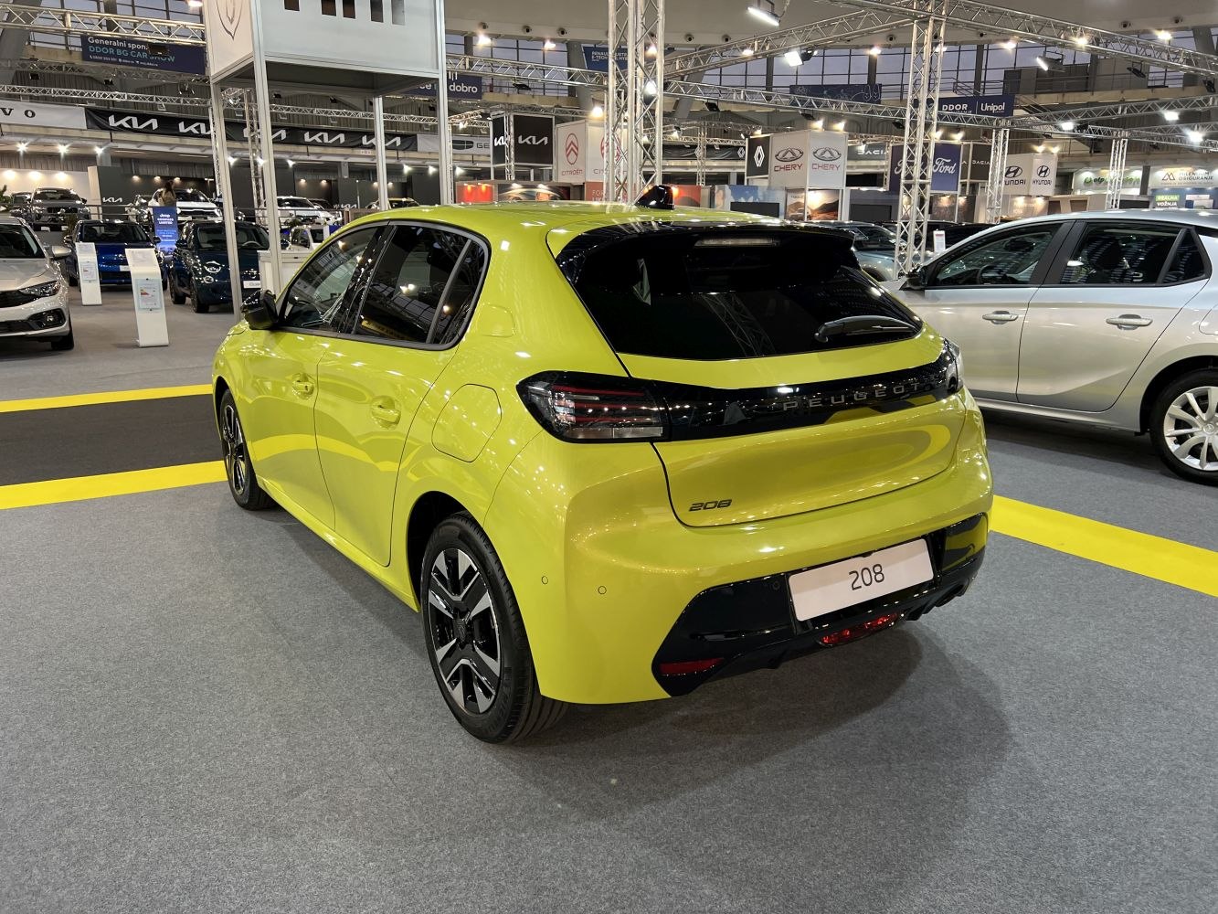 Rear view of 2024 compact hatchback with distinctive taillights and sporty rear design