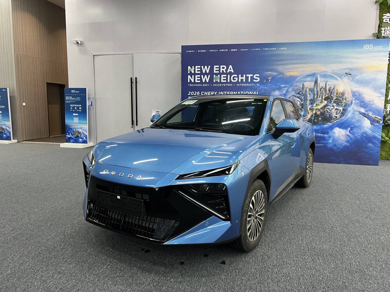 Front and side view of a futuristic SUV with sharp headlights and aggressive grille