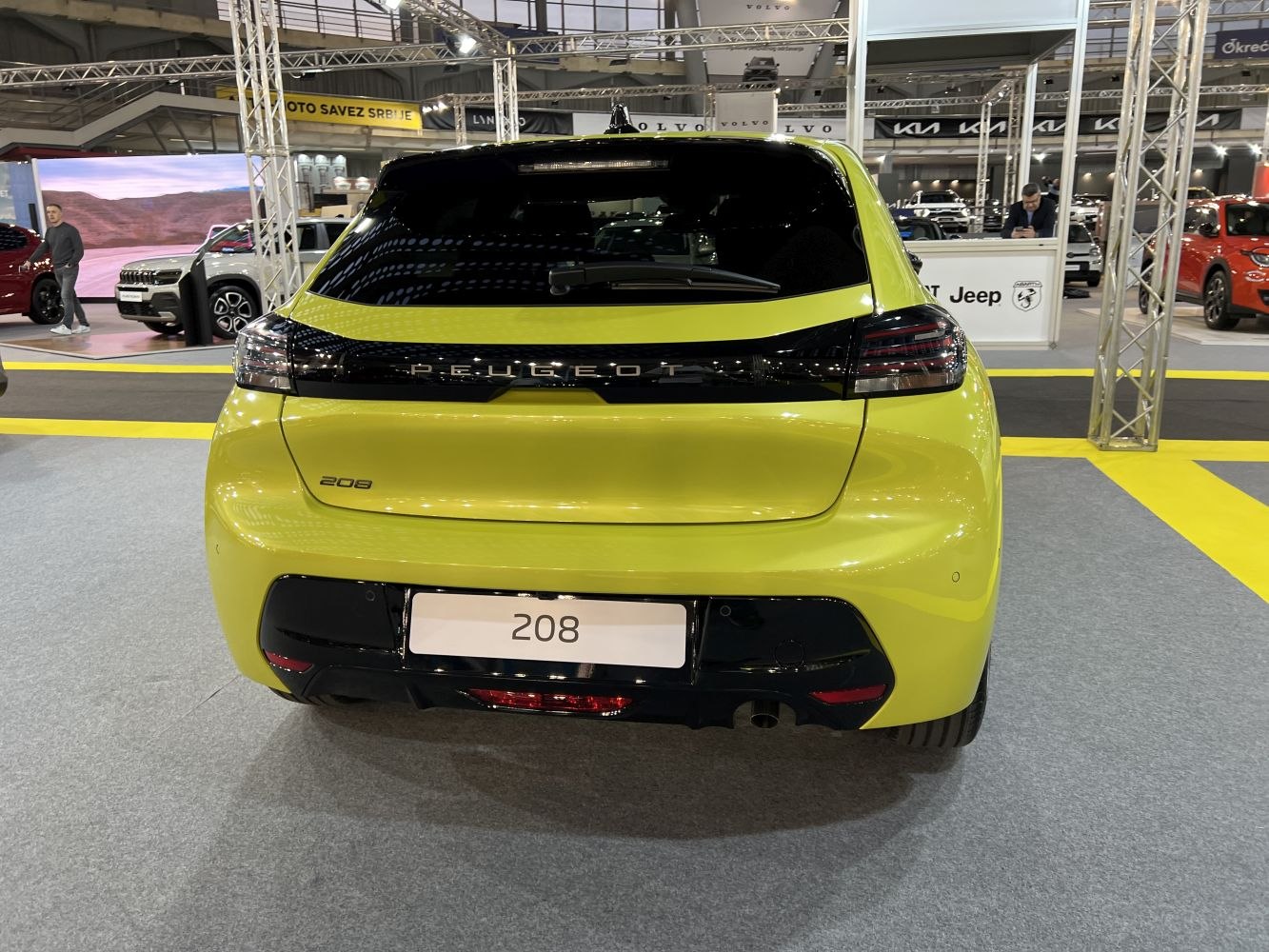 Rear view of a modern hatchback with sleek taillights and black detailing
