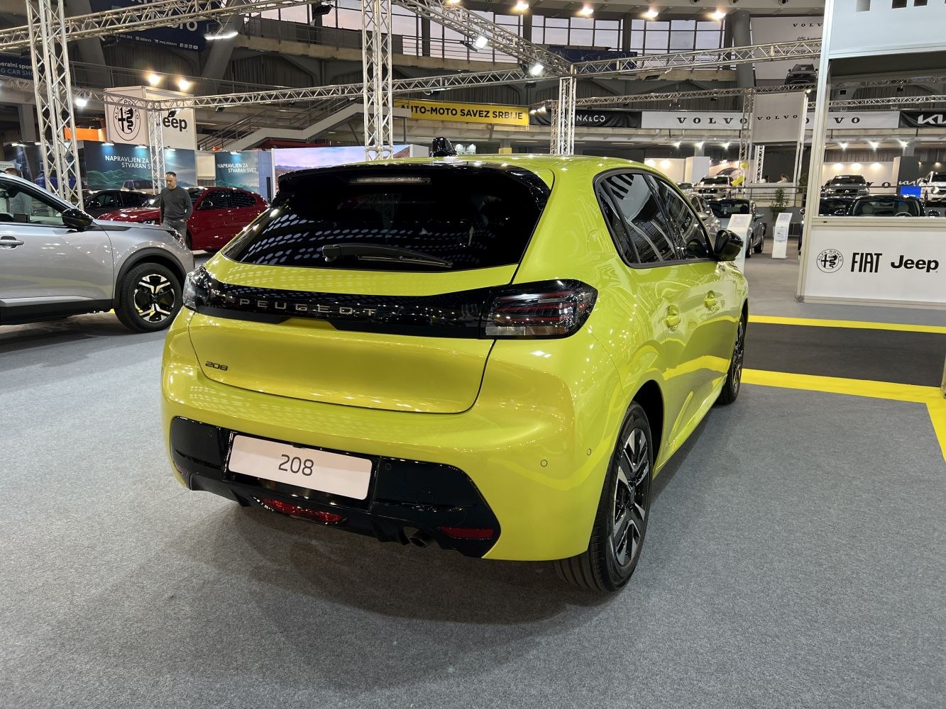 Rear view of a compact hatchback with LED taillight strip and sporty bumper