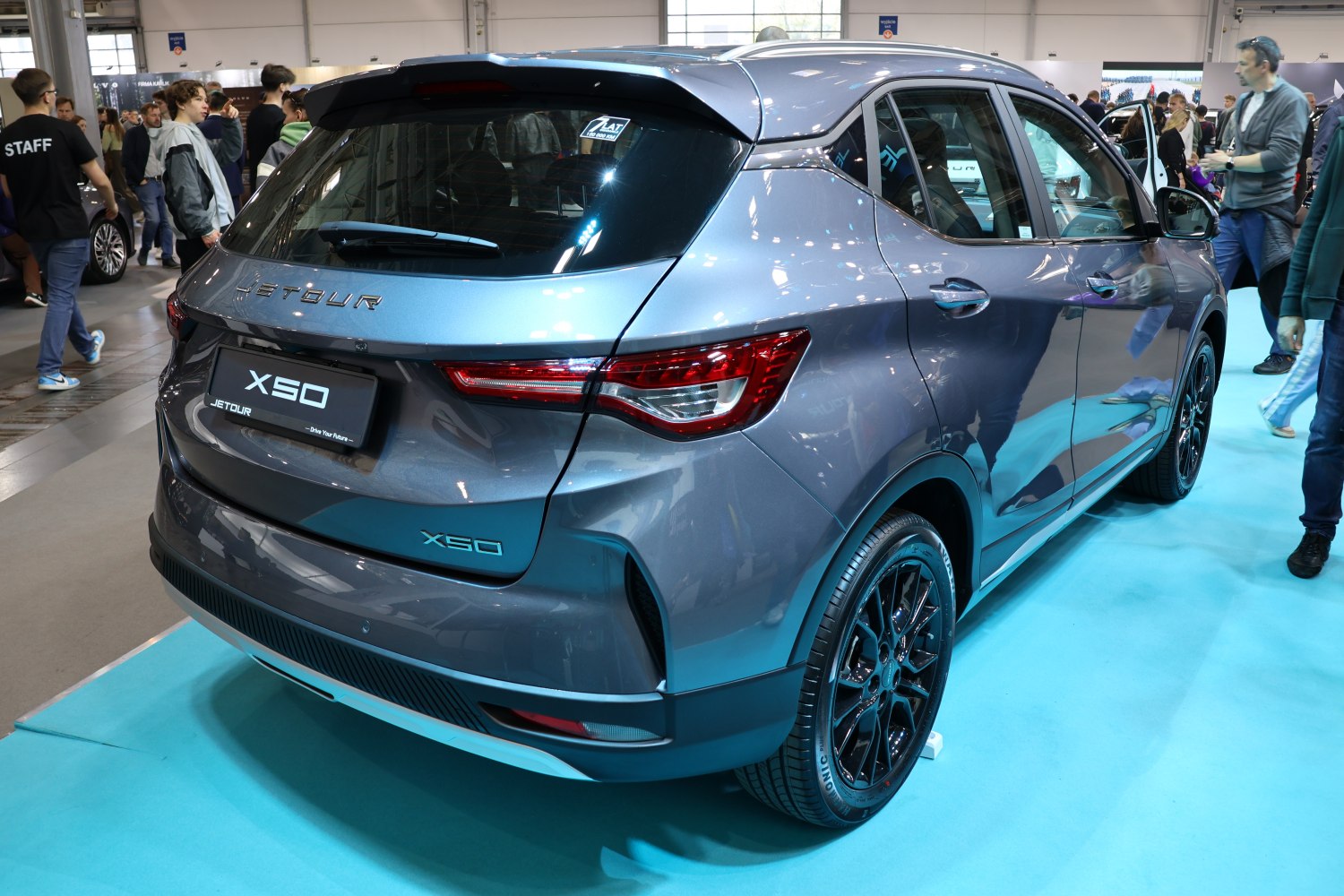 Rear design with sharp tail lights and sporty black alloy wheels