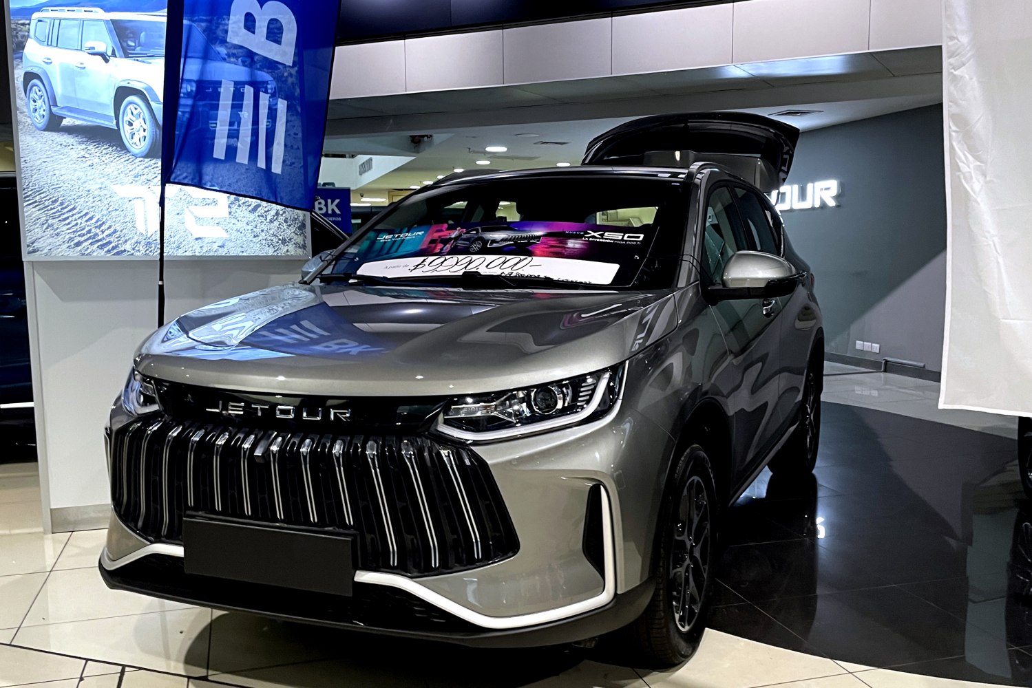 Bold vertical grille and sleek LED headlights on a modern SUV front.