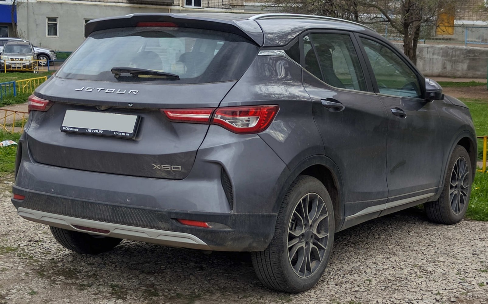 Rear exterior with LED taillights and multi-spoke alloy wheels