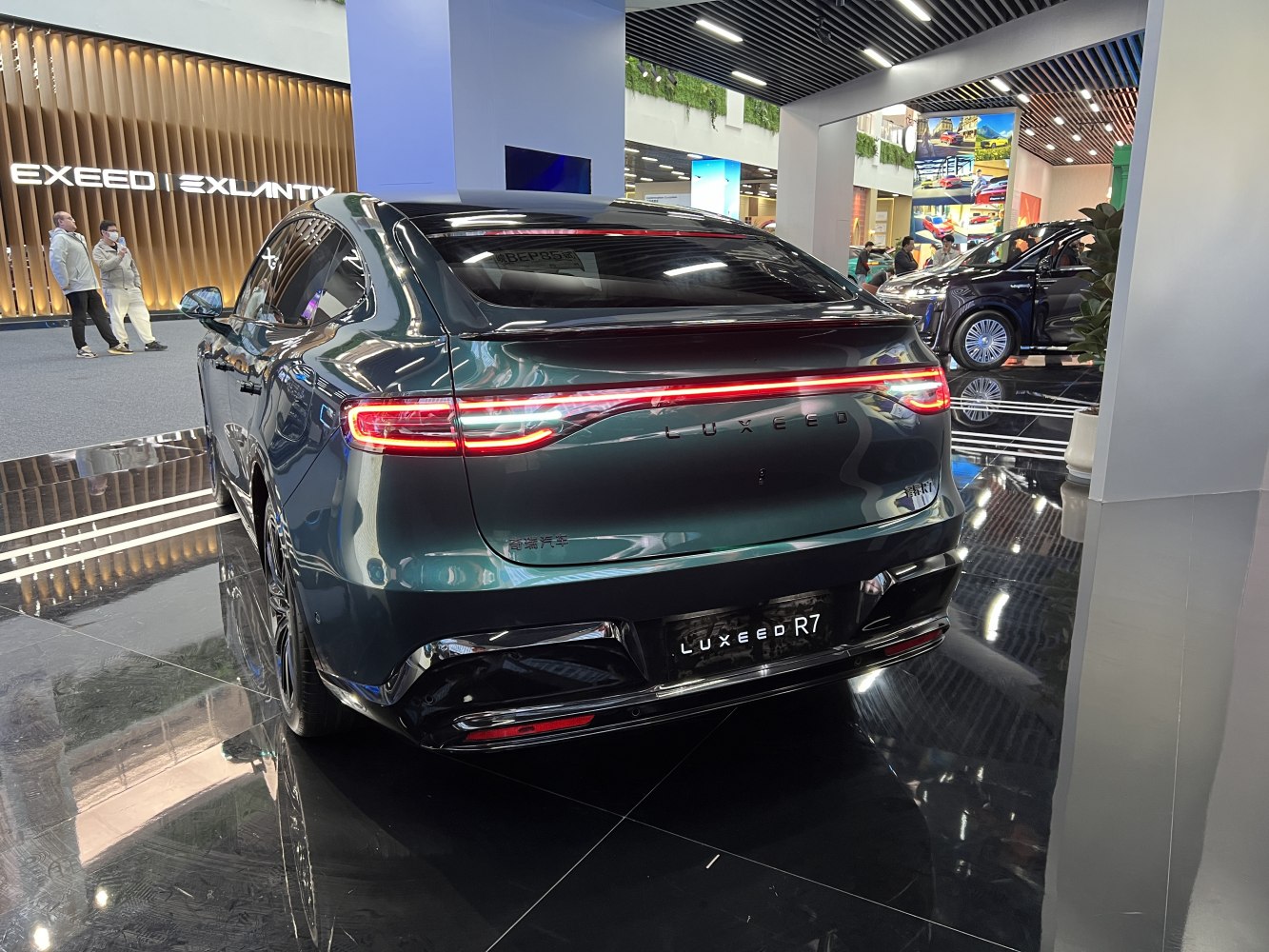 Rear view with continuous LED taillight strip and sleek aerodynamic styling