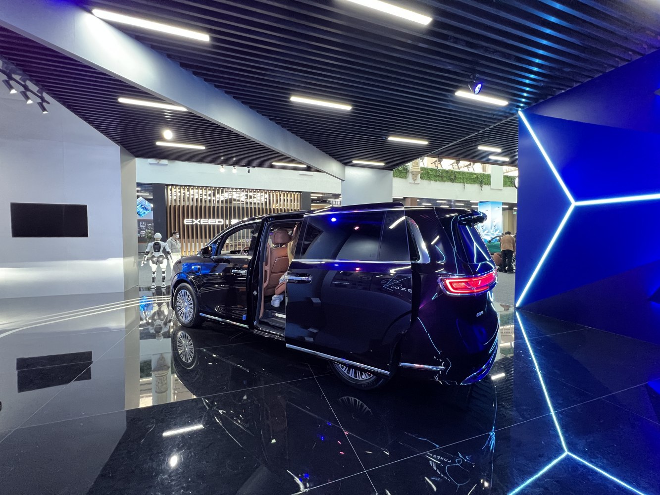 Rear and sliding door interior view of a luxury minivan