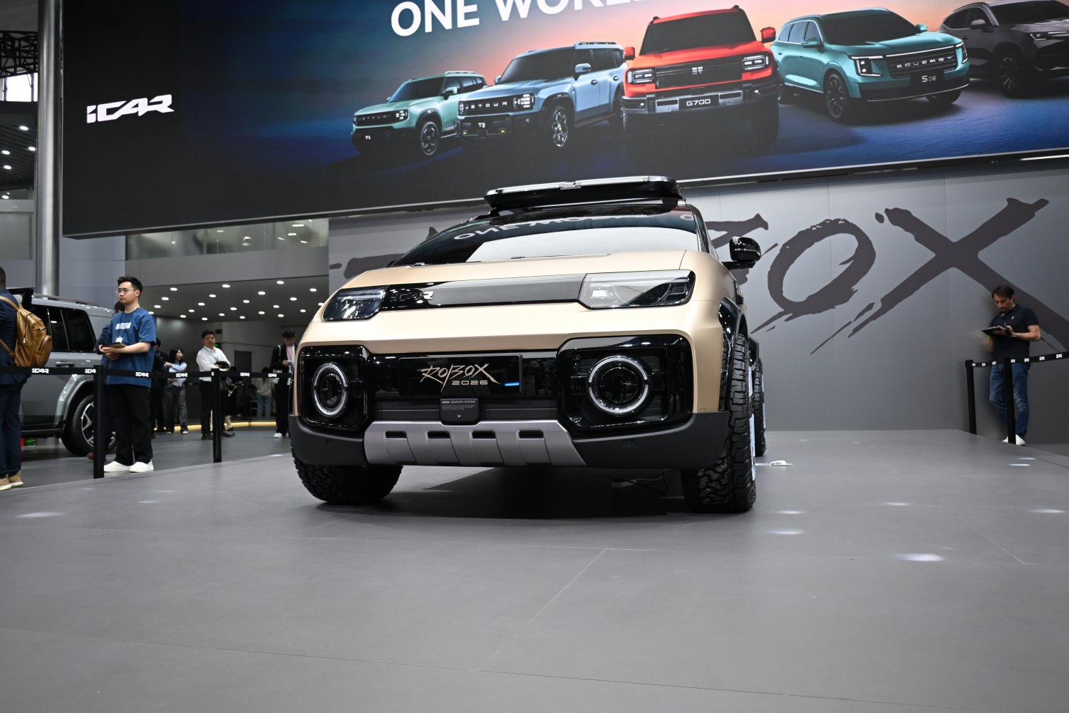 Rugged SUV front with circular headlights and off-road tires