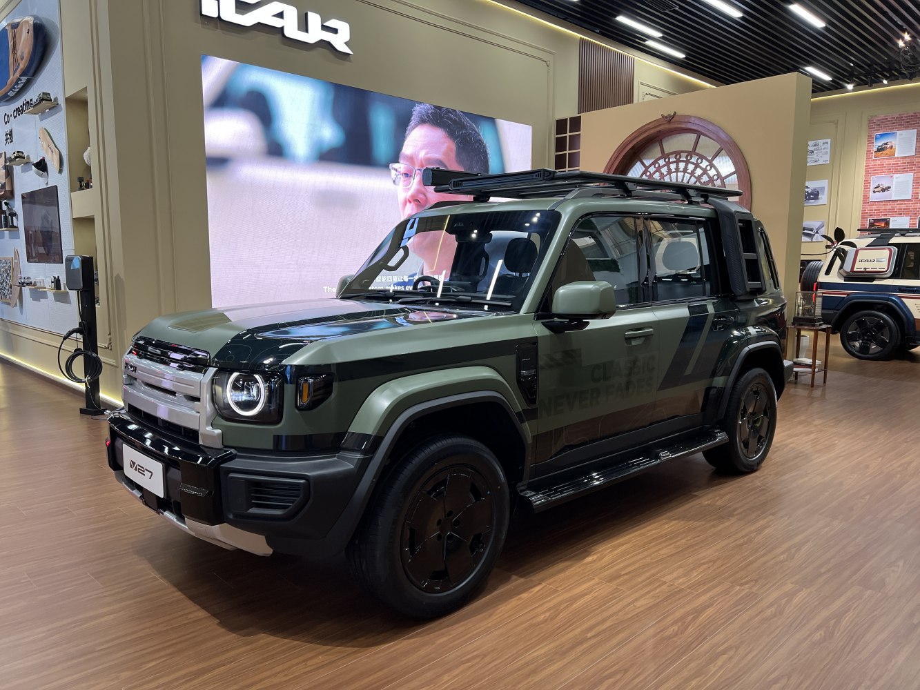 Rugged off-road SUV with roof rack and circular LED headlights