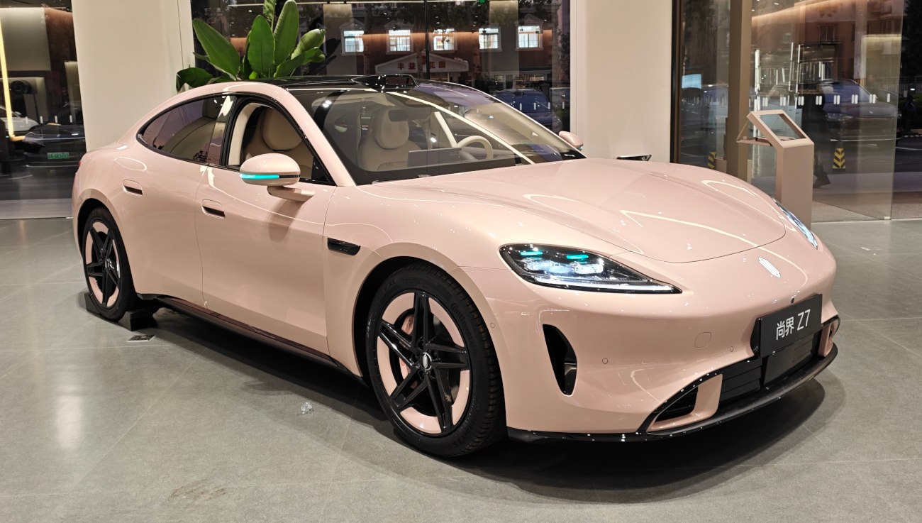 Sleek electric sedan with aerodynamic shape and LED headlights