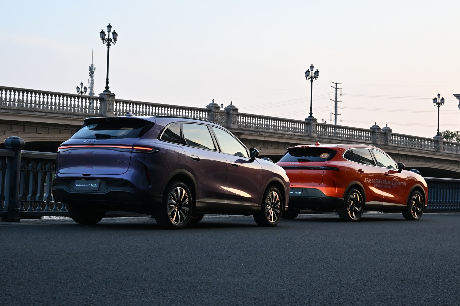 Two SUVs with sleek LED tail lights and aerodynamic rear design
