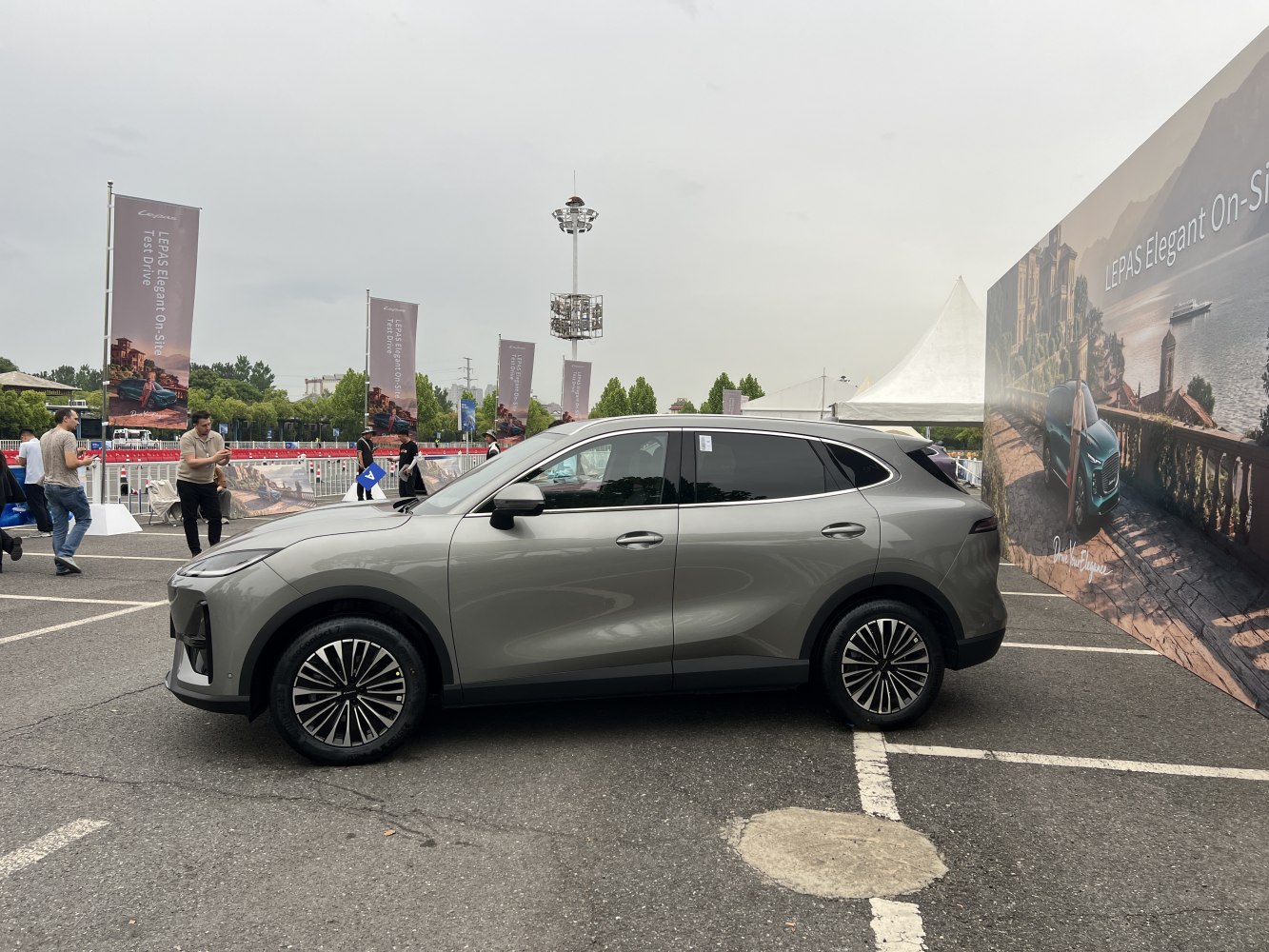 Side profile of a modern SUV with sleek body and alloy wheels