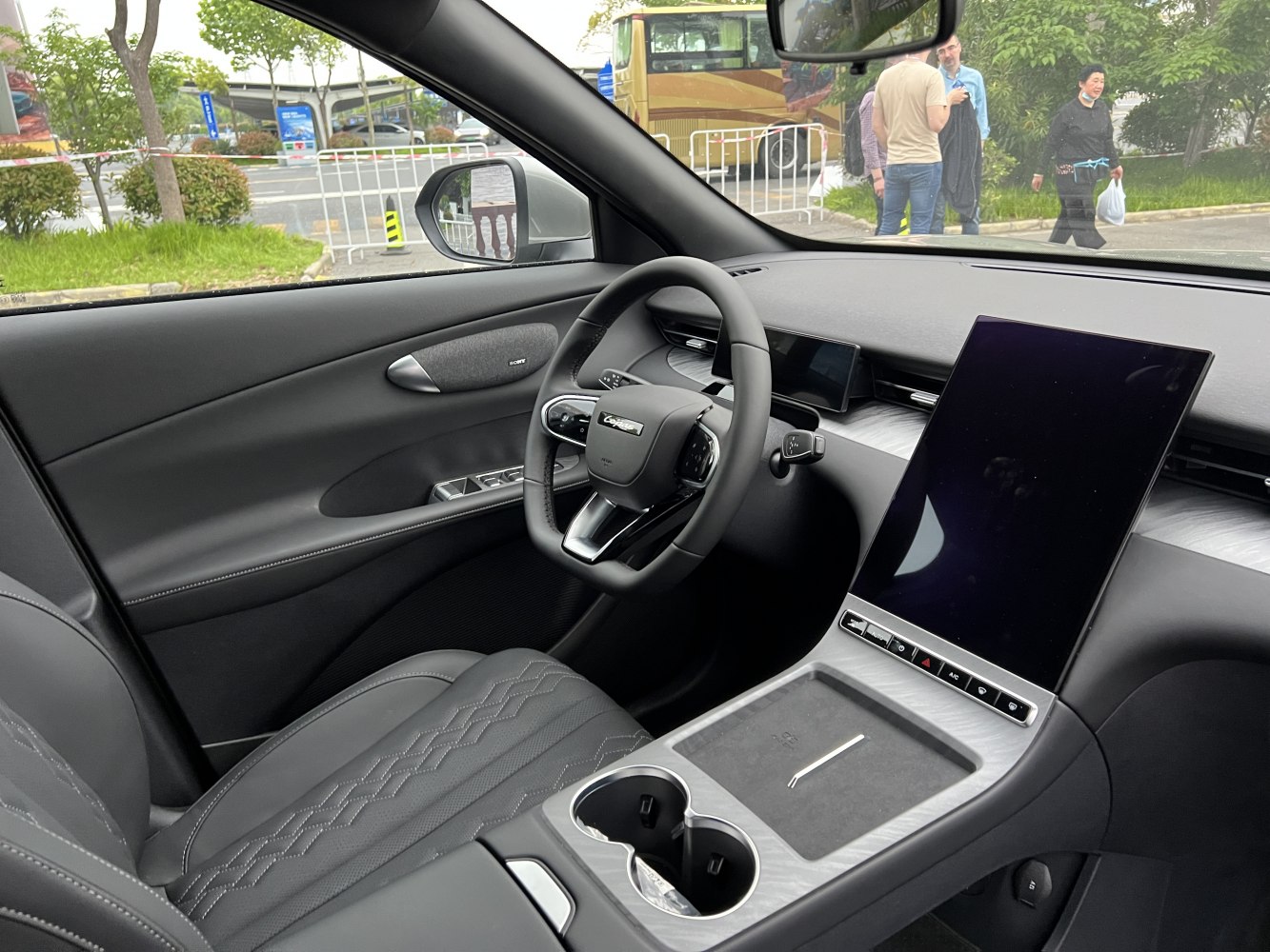 Digital dashboard and large vertical touchscreen in modern car interior
