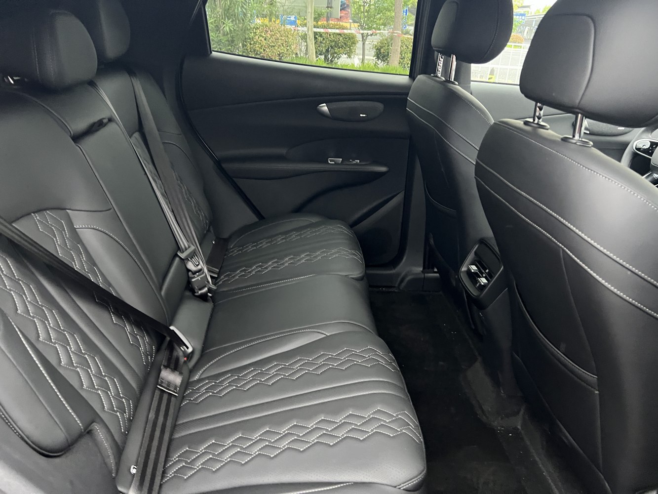 Black quilted leather rear seats with spacious legroom