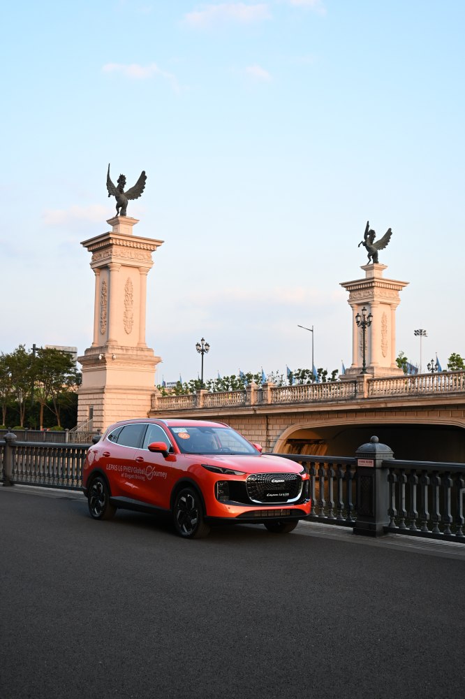 SUV with bold front grille and LED headlights in urban environment